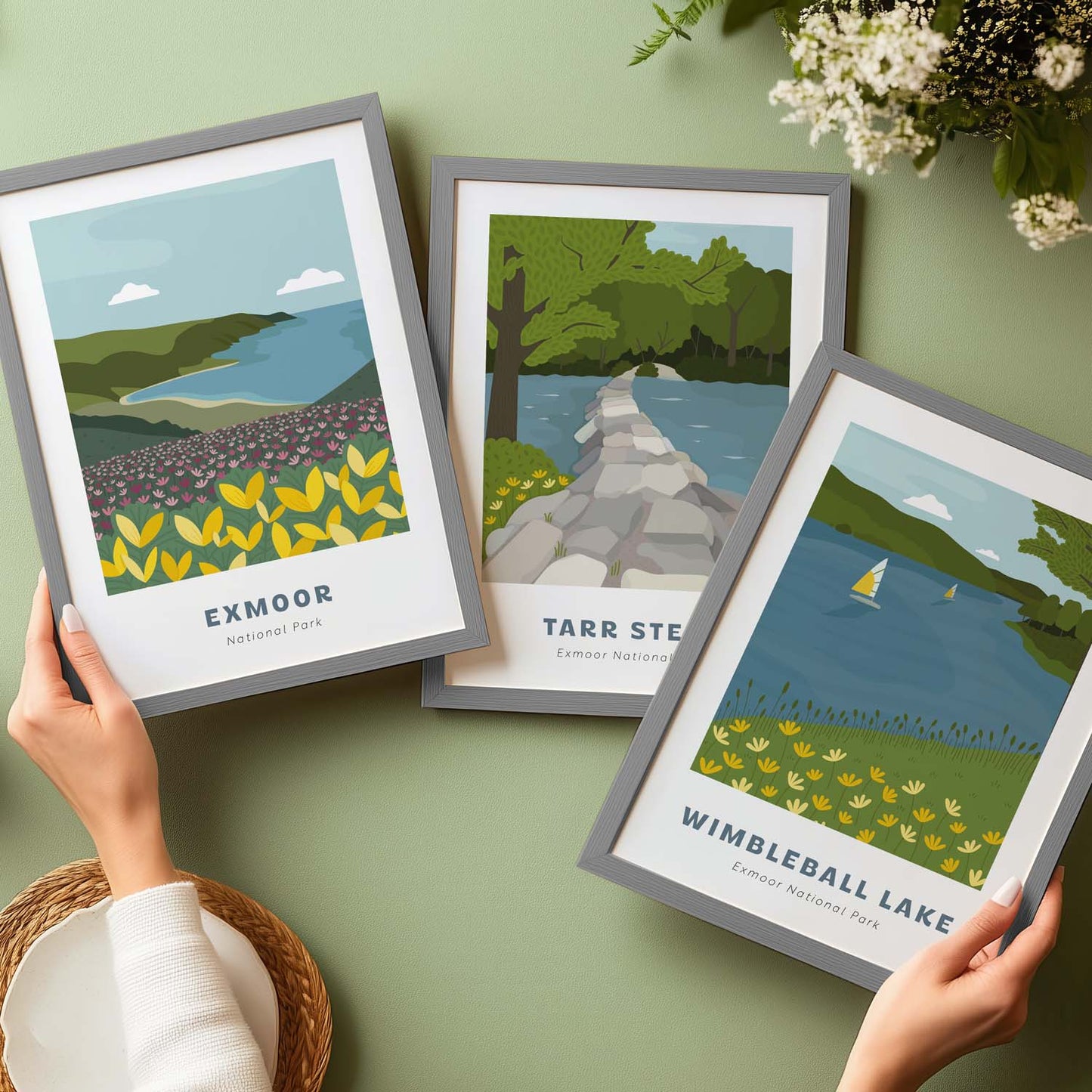 Another 3 prints available in the Exmoor National Park series. These are Exmoor, Tarr Steps and Wimbleball Lake. These are shown in A4 frames on a green surface.
