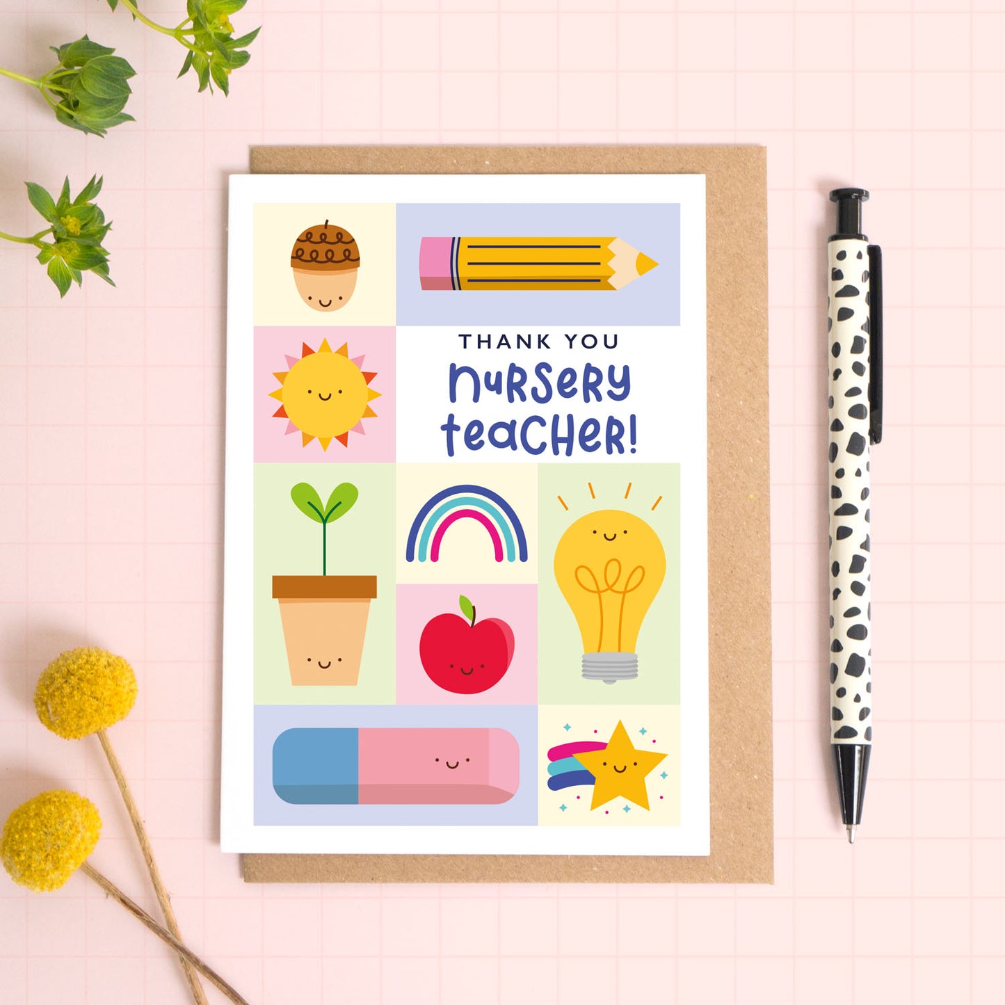 Thank you nursery teacher card with a kraft brown envelope. This nursery teacher thank you card features a variety of happy school related objects including an acorn, pencil, growing seed, apple and an eraser. The perfect card for nursery staff!