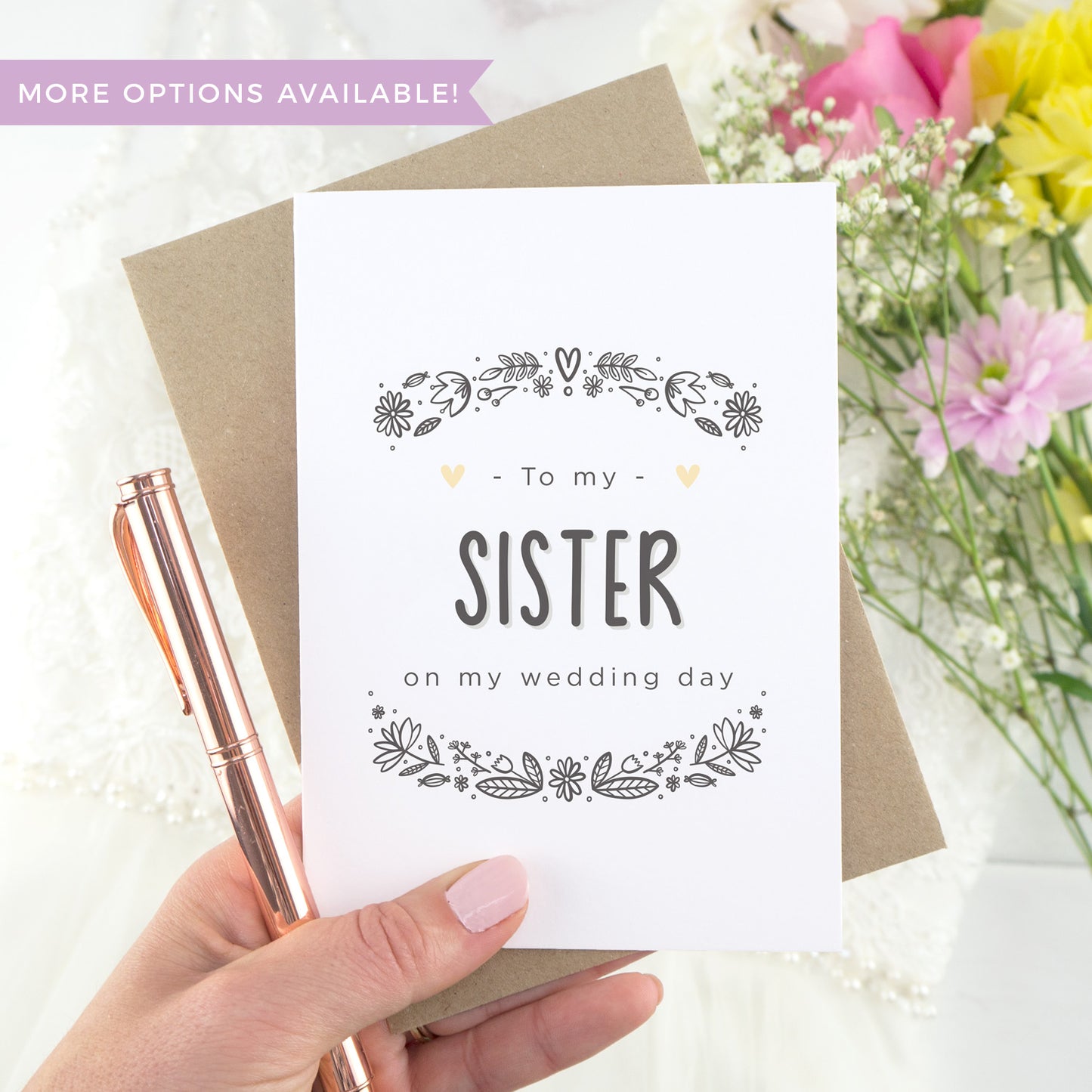 To my sister on my wedding day. A white card with grey hand drawn lettering, and a grey floral border. The image features a wedding dress and bouquet of flowers.