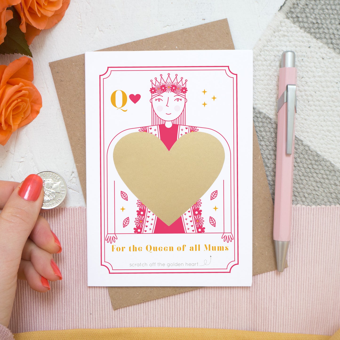 For the queen of all mums! A scratch card by Joanne Hawker featuring a bright pink queen and the gold heart after it has been applied and before it is scratched off.