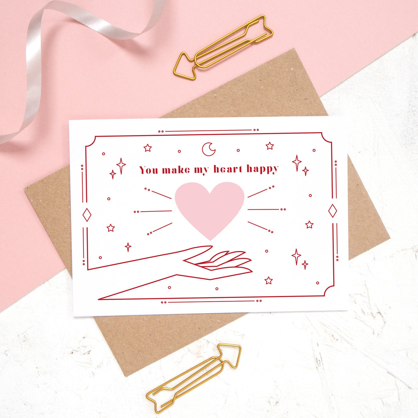 This card features the phrase 'you make my heart happy' with a heart and cosmic decor.