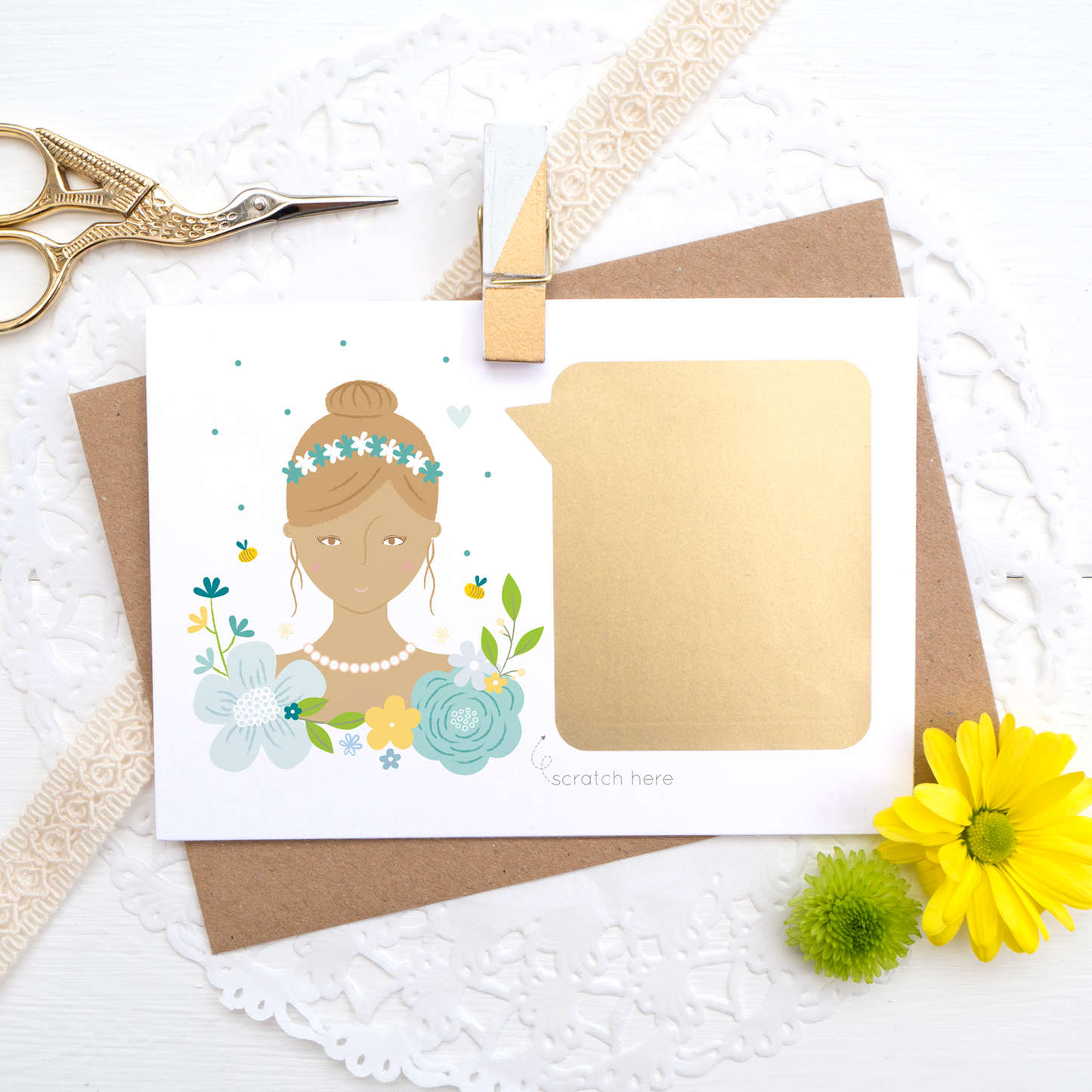 The blue version of the will you be my bridesmaid personalised scratch and reveal card with the panel unscratched
