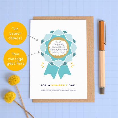 A number 1 dad scratch card featuring a rosette with a scratch off centre where your personalised message will be hidden. This card is showing the blue colour palette and has all of the personalisation options on the left. These are the colour choice and your message. The gold has been scratched off.