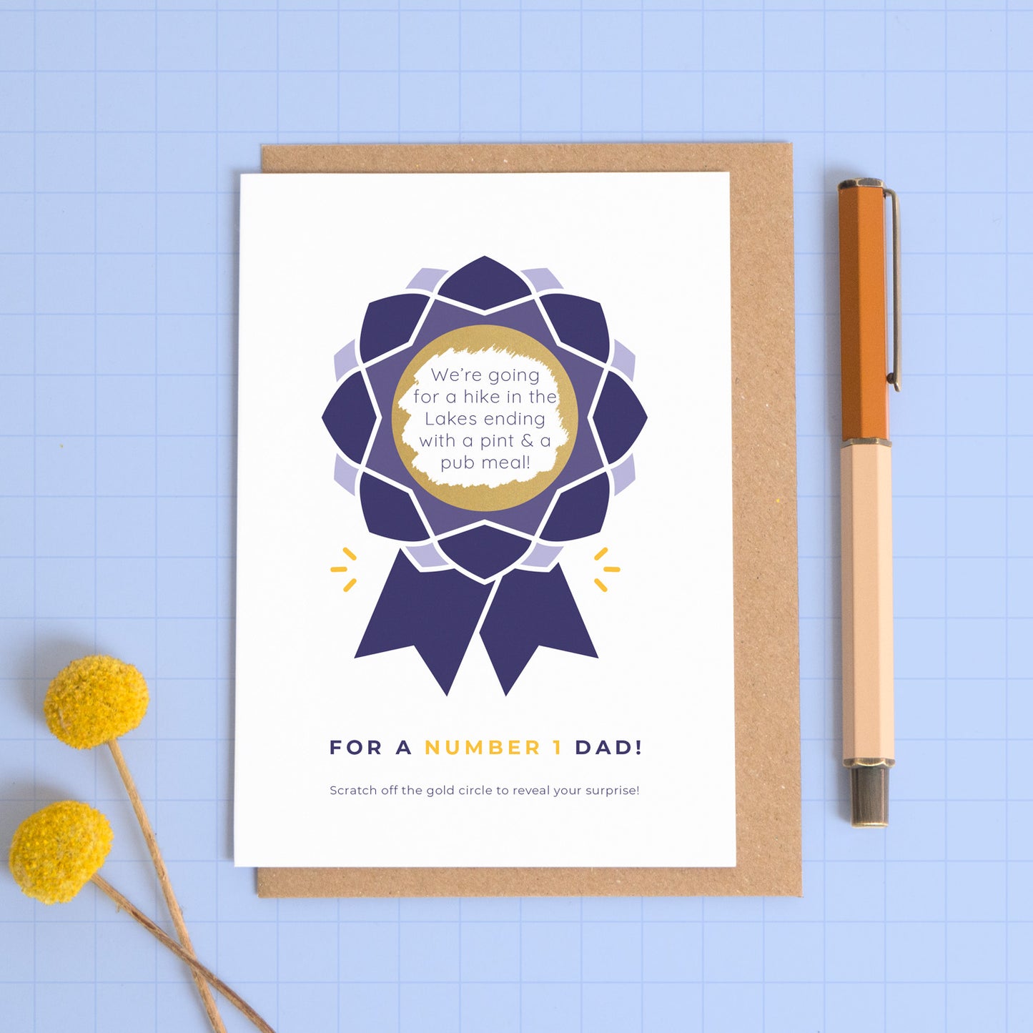 A number 1 dad scratch card featuring a rosette with a scratch off centre where your personalised message will be hidden. This card is showing the navy colour palette.