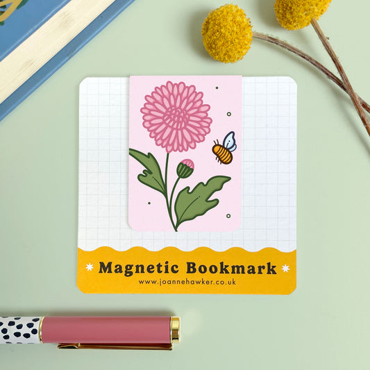 Magnetic bookmark with floral chrysanthemum design and bee illustration on a light green background
