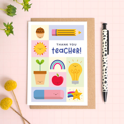 Thank you teacher card with a kraft brown envelope. This teacher thank you card features a variety of happy school related objects including an acorn, pencil, growing seed, apple and an eraser. The perfect card for primary school teachers!
