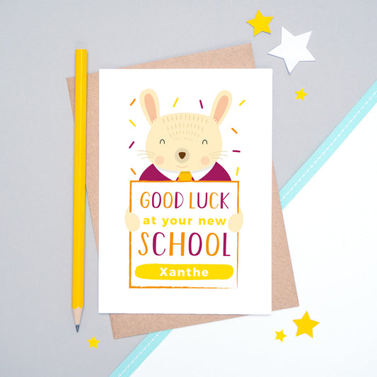 A good luck at your new school personalised card featuring a friendly rabbit sat on a grey and white background.