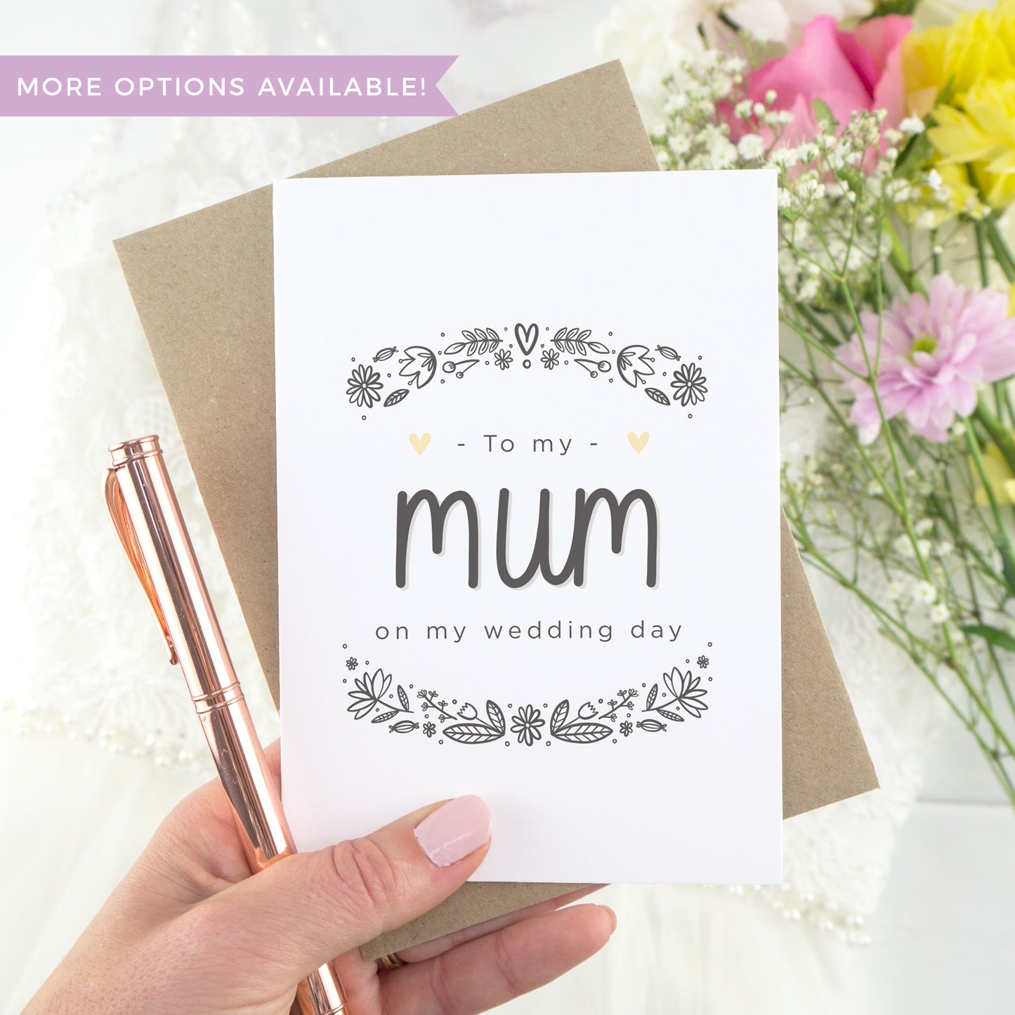 To my mum on my wedding day. A white card with grey hand drawn lettering, and a grey floral border. The image features a wedding dress and bouquet of flowers.