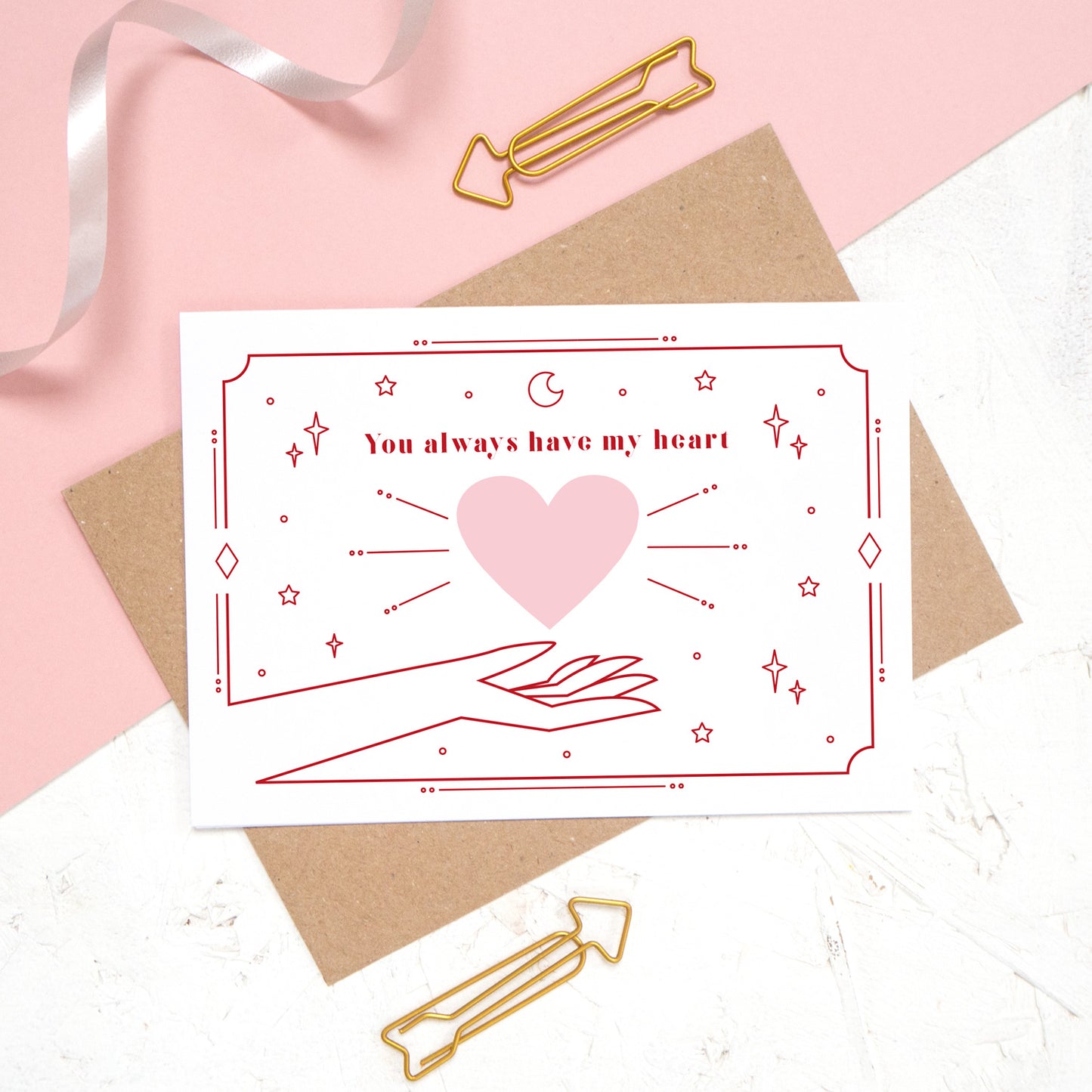 You always have my heart love and romance card designed by Joanne Hawker. This card features the phrase 'you always have my heart' with a heart and cosmic decor.