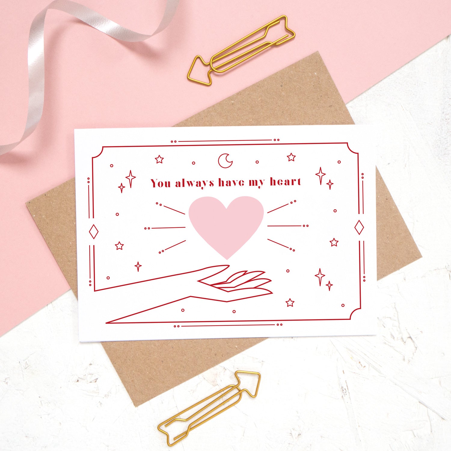 You always have my heart love and romance card designed by Joanne Hawker. This card features the phrase 'you always have my heart' with a heart and cosmic decor.