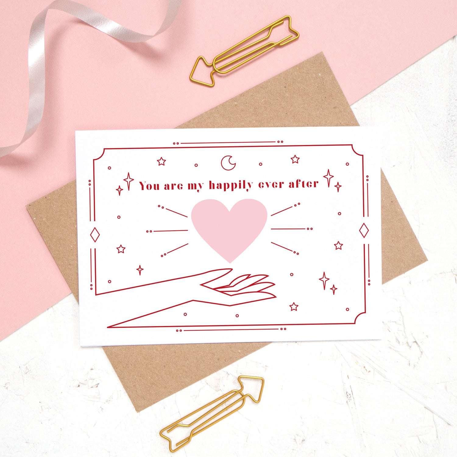 This card features the phrase 'you are my happily ever after' with a heart and cosmic decor. The perfect card for an anniversary or the valentines before your wedding day!