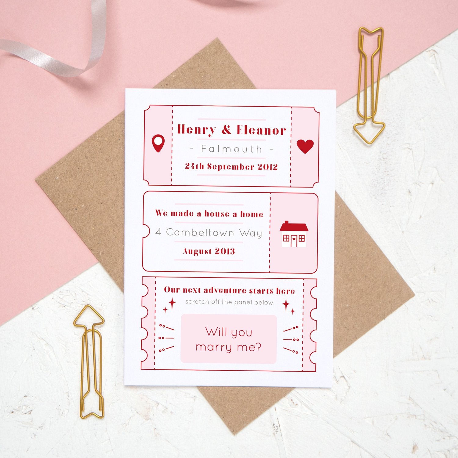 A personalised will you marry me scratch card where the question has been fully revealed. The card details special moments such as when you first met and where you first lived together.