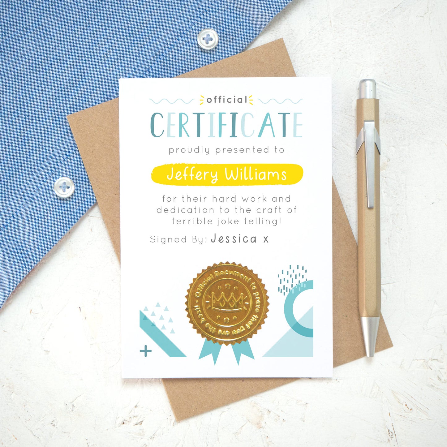A personalised fathers day certificate printed on white card with varying tones of blue and pops of yellow and gold. Each certificate has a shiny gold seal and space to sign your name. Photographed on a white background with a blue shirt.