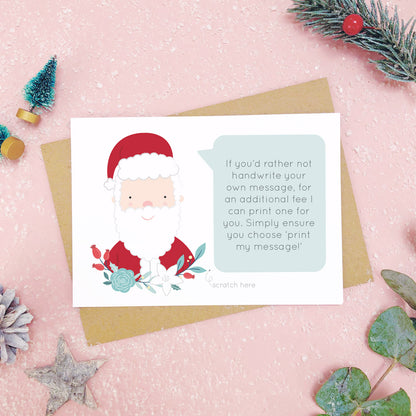 An example of a printed message on a personalised scratch card. Shot on a pink background with festive photo props.