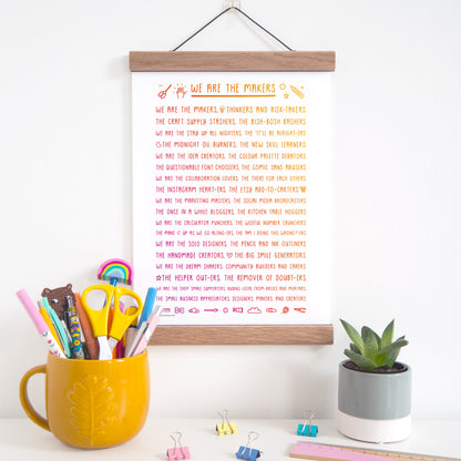 We are the makers rhyming print about what it means to be a maker in rainbow, displayed in an oak magnetic frame which is available as an add on purchase.
