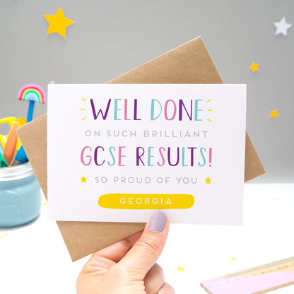 'Well done on such brilliant GCSE Results! So proud of you [insert name].' A congratulations card featuring my hand drawn type in varying shades of pink, purple and blue, with a bright yellow personalised box for the recipient name!