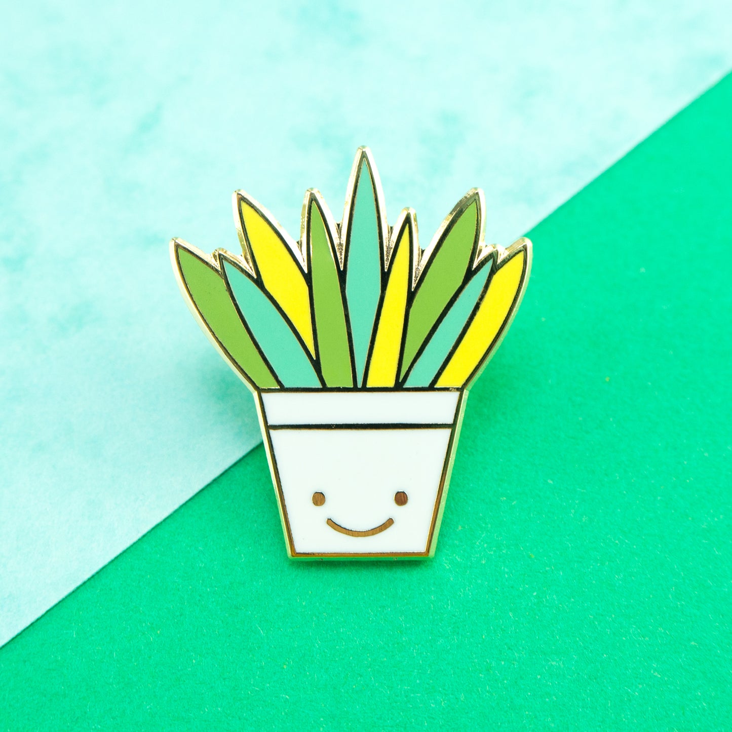 Single Aloe Vera Hard Enamel Pin in a happy plant pot