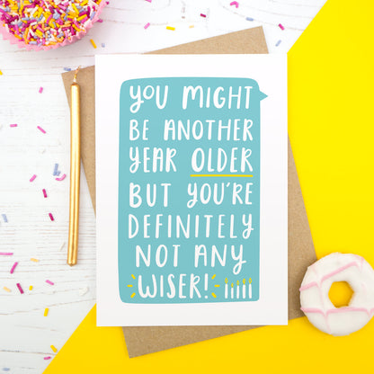 You might be another year old but you're definitely not any wiser birthday card in blue